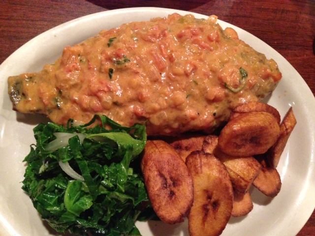 Whole Fried Fish in Coconut Curry Sauce with Fried Plantains and Collared Greens